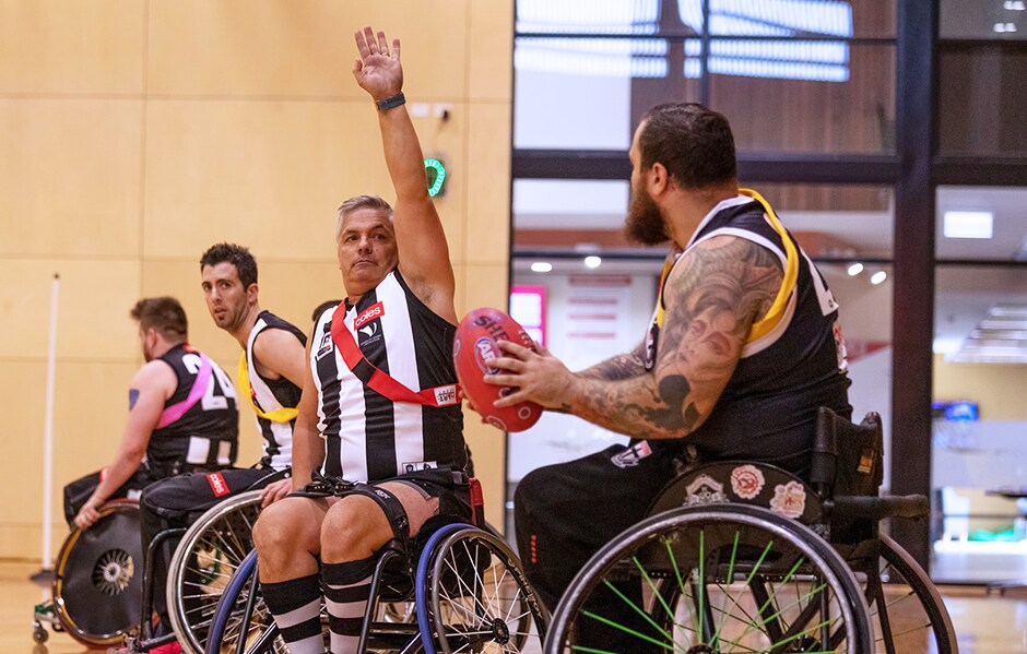 VWFL_RD7.png Collingwood's Brett Newman defends in the game against St Kilda - Collingwood Magpies
